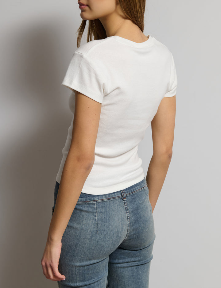 T-shirt panna con scritta "Capricciosa"
