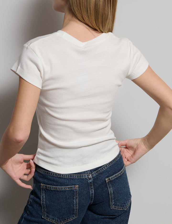 T-shirt panna con stampa bassotto