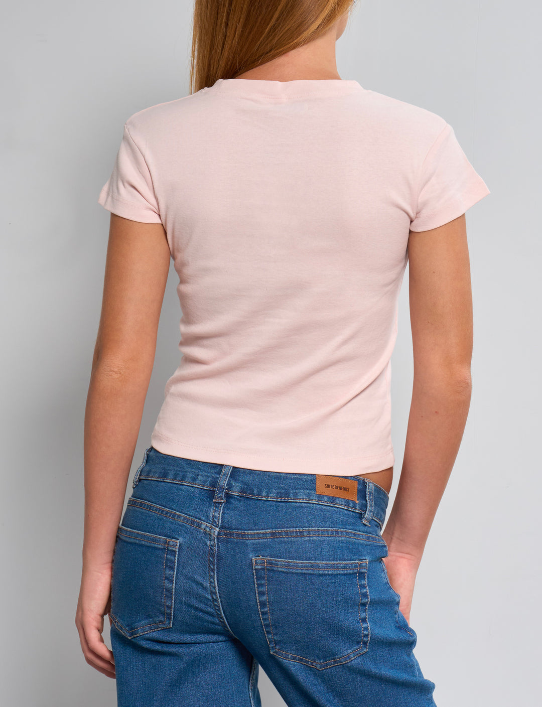 T-shirt rosa con scritta "bella impossibile" retro