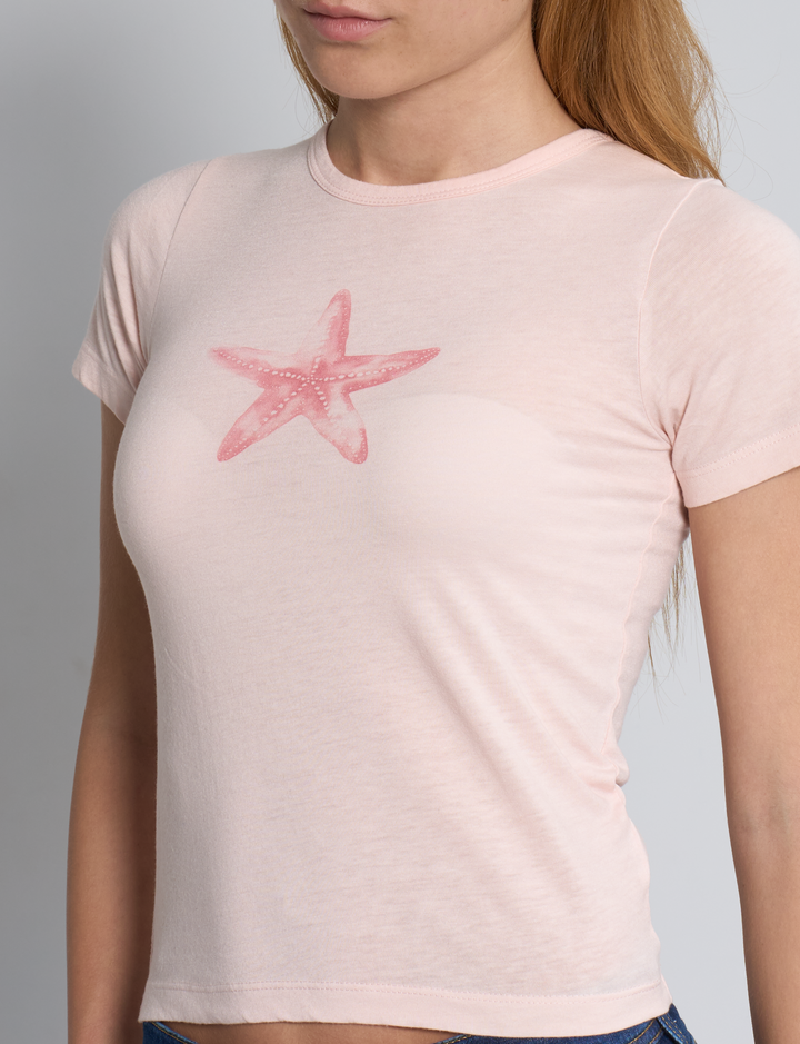 T-shirt rosa con stampa stella marina dettaglio