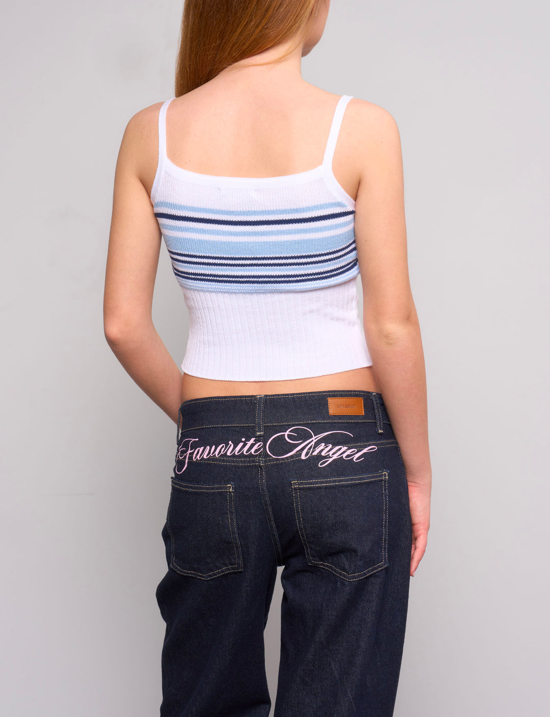Top in maglia a righe con fiocco