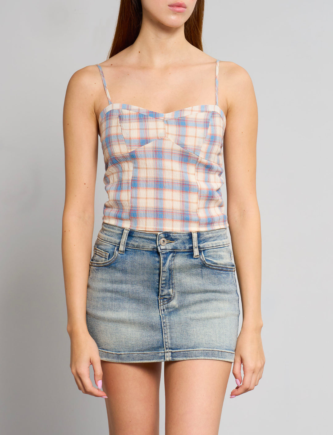 Top a quadri effetto corsetto frontale