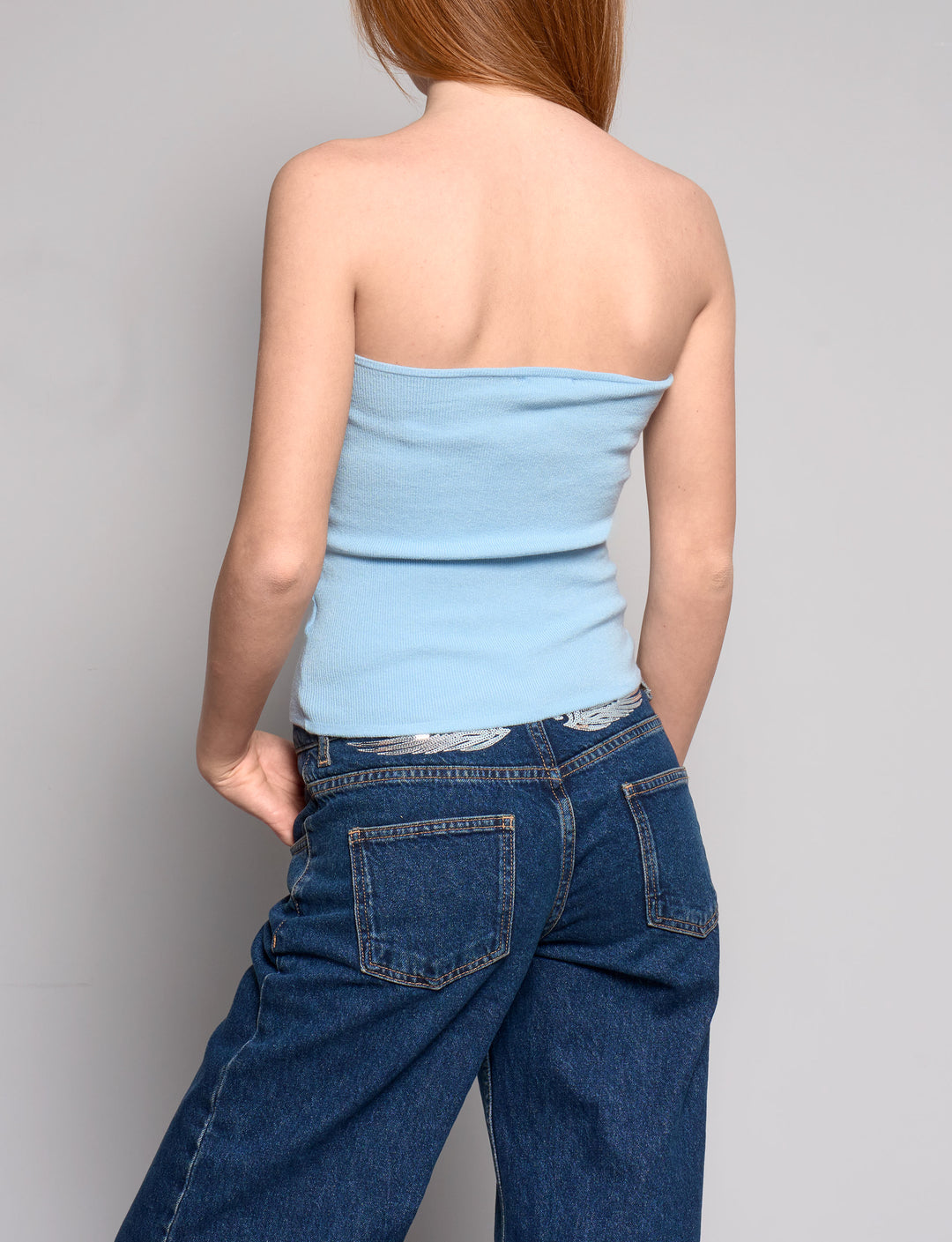 Top azzurro a fascia in maglia