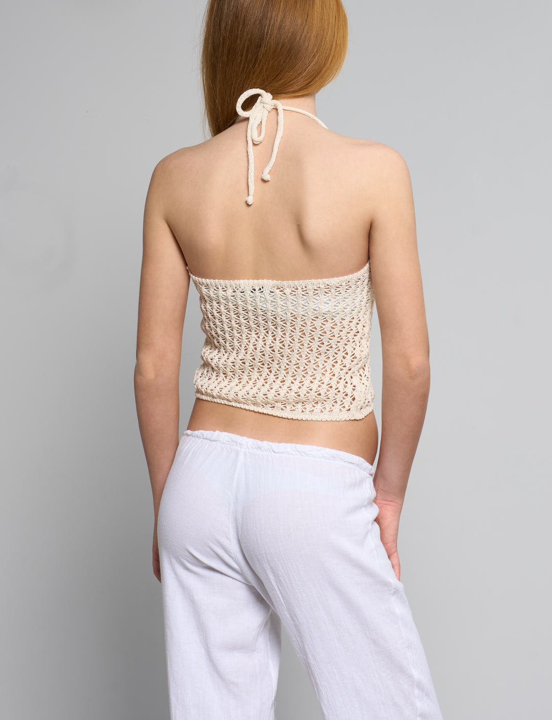 Top beige crochet con schiena scoperta retro