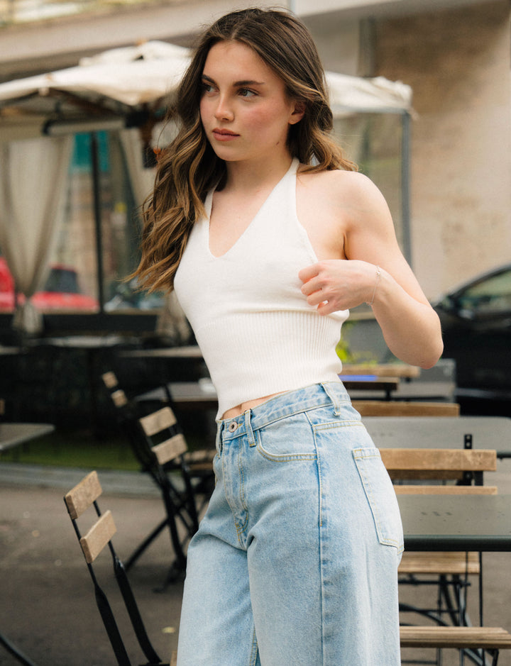 Top bianco in maglia con schiena scoperta