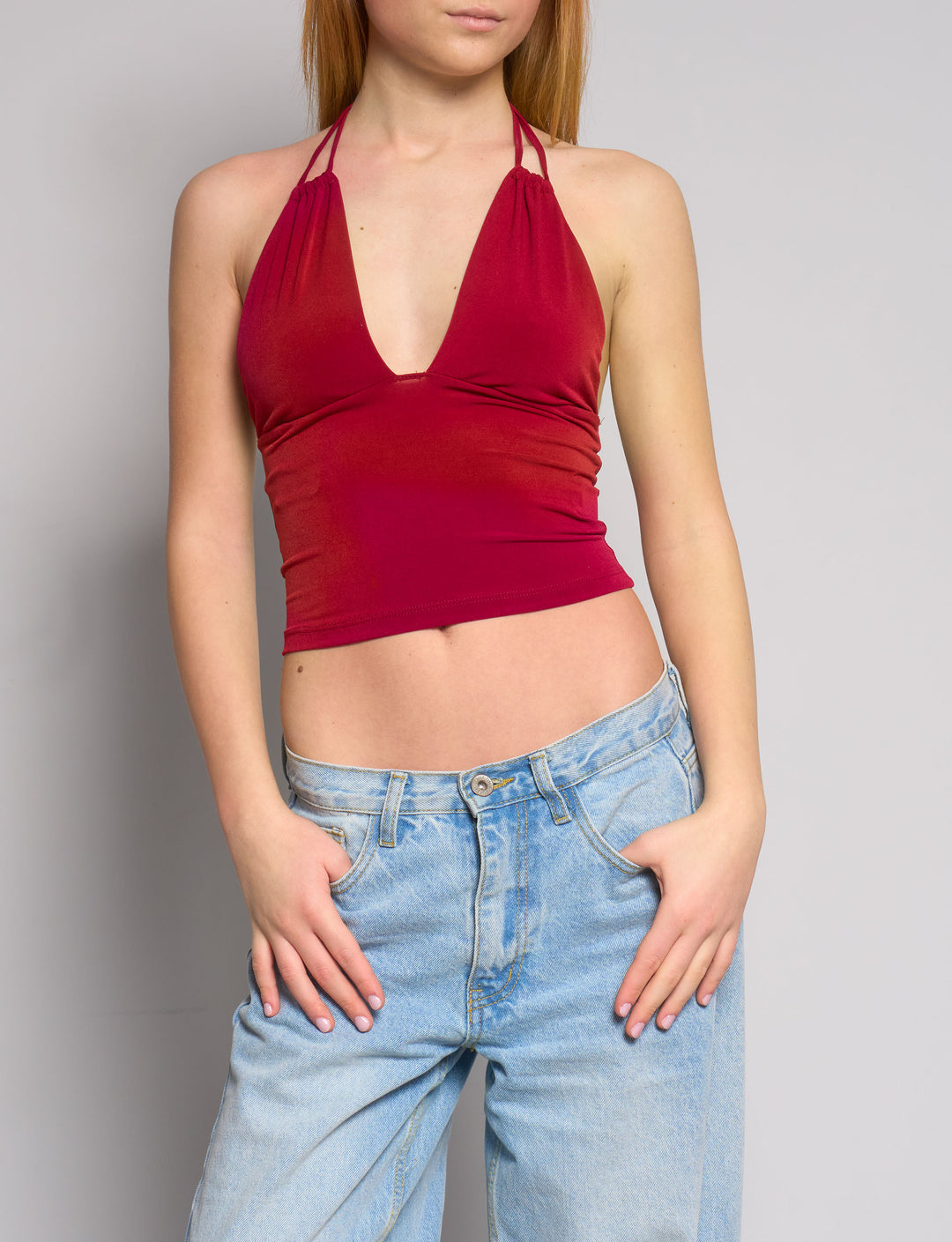 Top bordeaux con scollo profondo e schiena scoperta