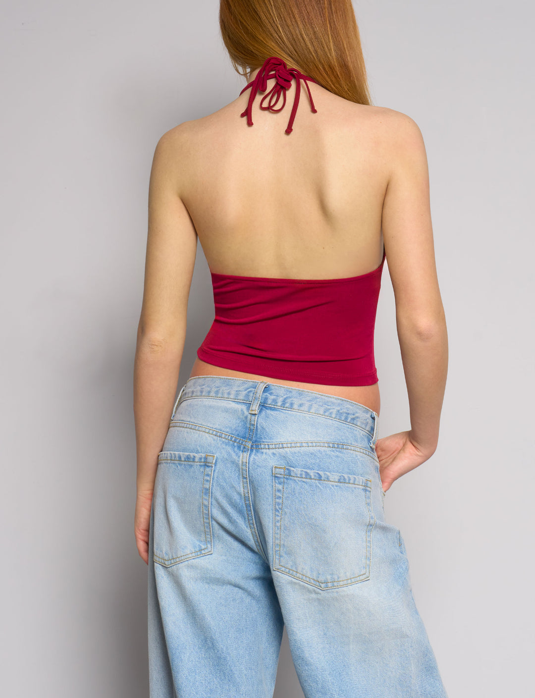 Top bordeaux con scollo profondo e schiena scoperta