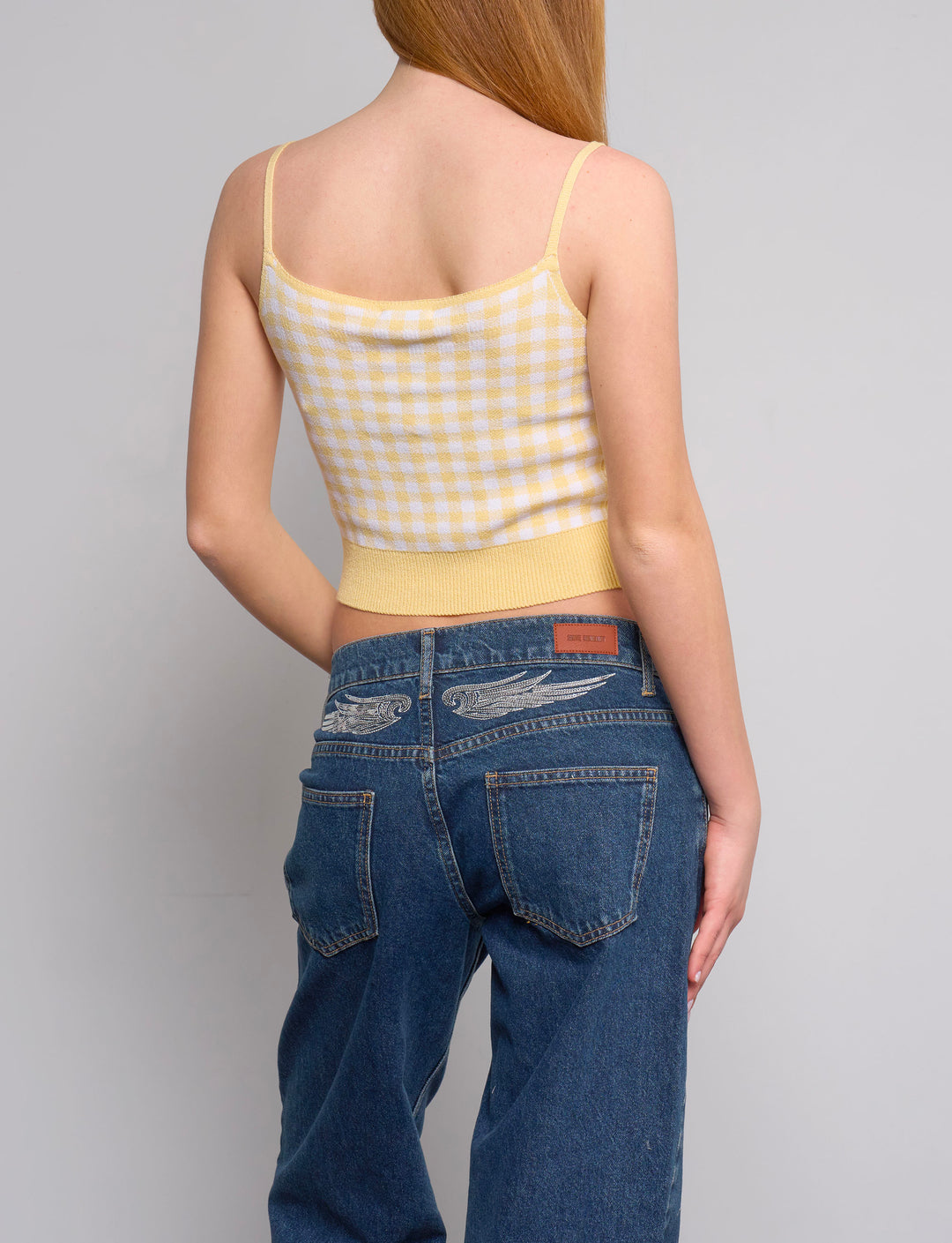 Top in maglia giallo a quadretti