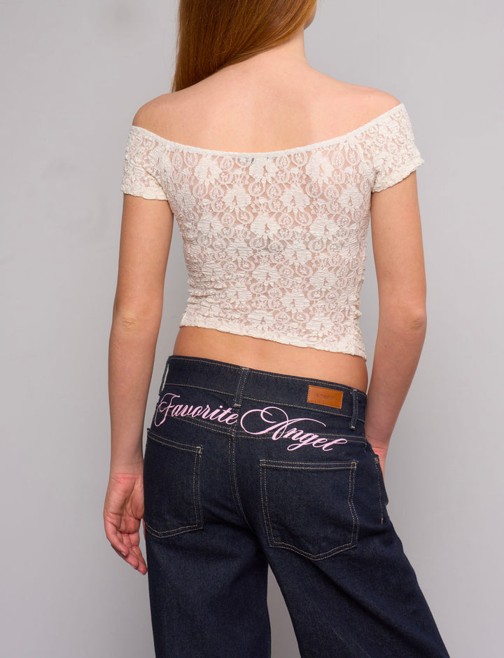 Top panna in pizzo con arricciatura