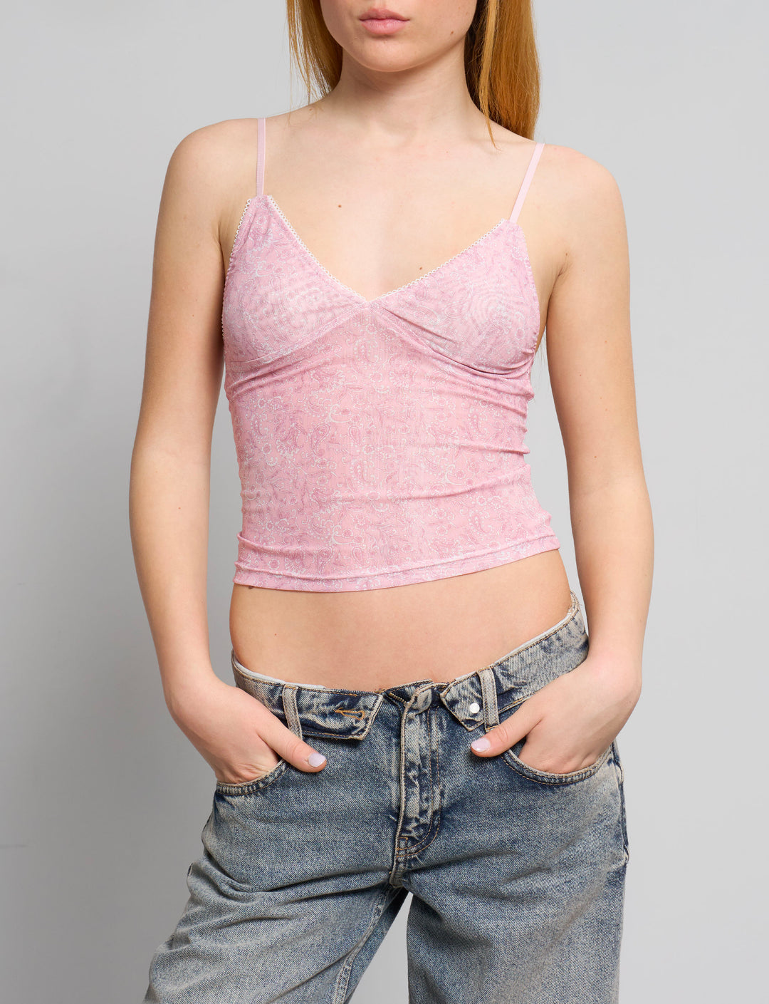 Top rosa a fantasia floreale frontale