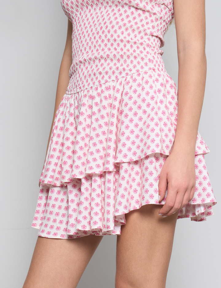 Vestito corto panna con gonna a balze e stampe rosa dettaglio
