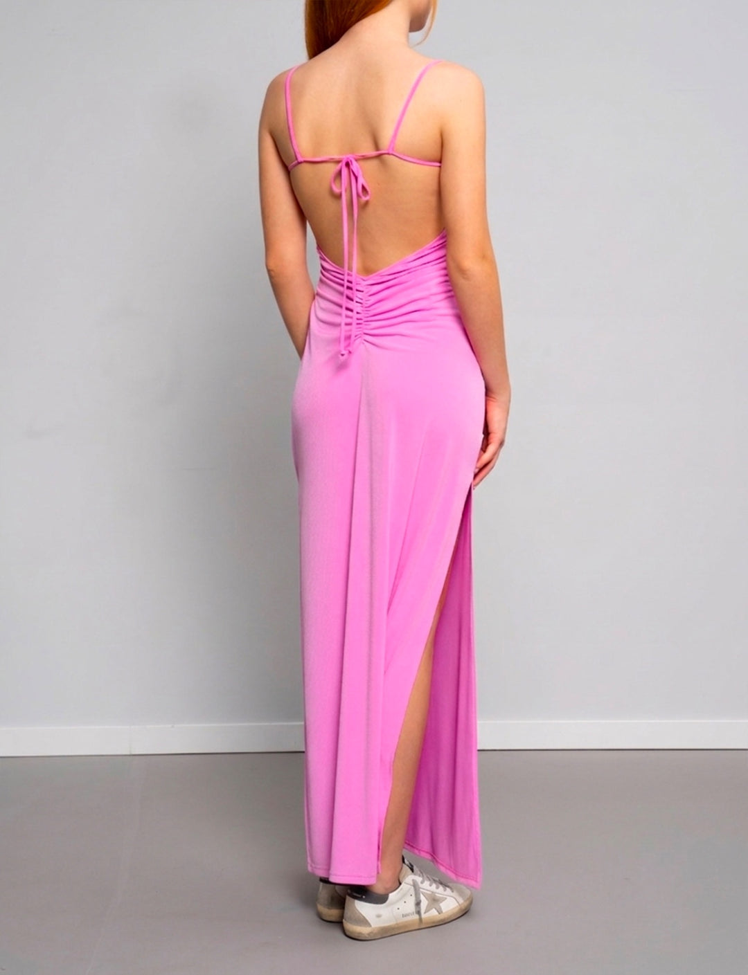 Vestito lungo fucsia con schiena scoperta retro