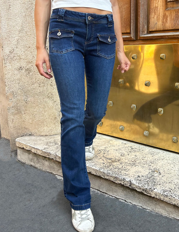 Jeans a zampa con tasche applicate